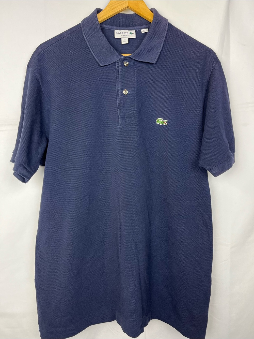 Lacoste Navy Blue Classic Fit Polo Shirt
Size: Large